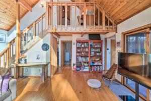 a large living room with a wooden ceiling at Berkshires Cabin 2 Mi to Appalachian Trail! in Otis