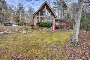 a small house in the middle of a field at Berkshires Cabin 2 Mi to Appalachian Trail! in Otis