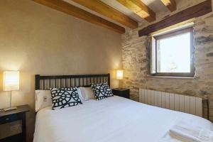 Postel nebo postele na pokoji v ubytování Casa Palacio de Mave