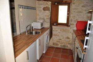 Kuchyň nebo kuchyňský kout v ubytování Casa Palacio de Mave