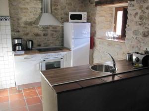 Kuchyň nebo kuchyňský kout v ubytování Casa Palacio de Mave