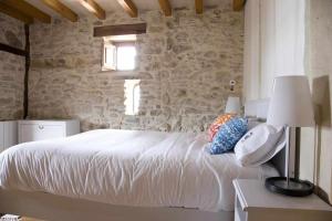Postel nebo postele na pokoji v ubytování Casa Palacio de Mave