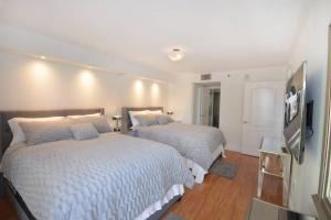 Postel nebo postele na pokoji v ubytování LUXURY CONDO LOCATED iN THE HEART OF MIAMI + 18 fotografií
