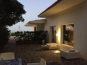 Posedenie v ubytovaní Villa Il Cappero