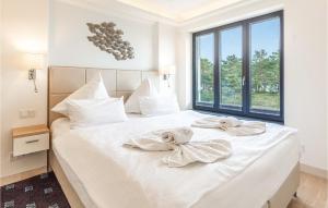 Ein Bett oder Betten in einem Zimmer der Unterkunft Eden