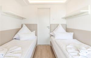 Ein Bett oder Betten in einem Zimmer der Unterkunft Eden
