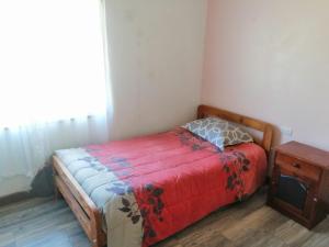 Säng eller sängar i ett rum på Cabaña Hijuela Colga