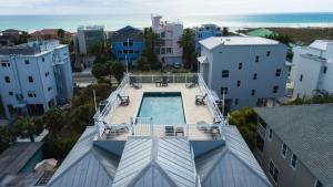 an overhead view of a swimming pool on top of a building at A Somewhere is Here by Beachside Management in Siesta Key
