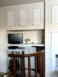 Kuchyň nebo kuchyňský kout v ubytování La Bartavelle - Petit duplex avec balcon à proximité des pistes