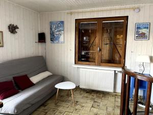 Posezení v ubytování La Bartavelle - Petit duplex avec balcon à proximité des pistes