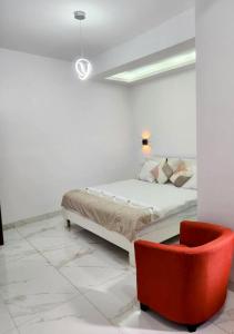 Ένα ή περισσότερα κρεβάτια σε δωμάτιο στο Residence Khadija +23 φωτογραφίες