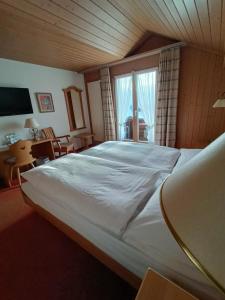 Krevet ili kreveti u jedinici u objektu Hotel Adler