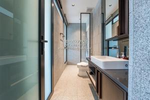 a bathroom with a sink and a toilet at Scarletz Suites by Edenzpace @ KLCC Area in Kuala Lumpur
