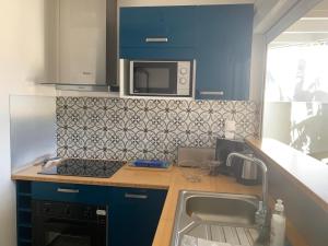Cucina o angolo cottura di Bleu Cannelle et Petimo