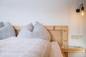 Łóżko lub łóżka w pokoju w obiekcie Appartement Adamhof Spielberg Leogang