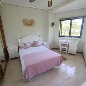 Postel nebo postele na pokoji v ubytování Apartamento Samil Primera Línea de Playa 2C