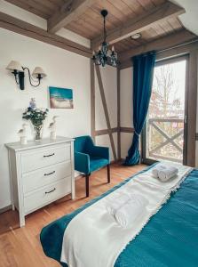 Łóżko lub łóżka w pokoju w obiekcie Villa Mila
