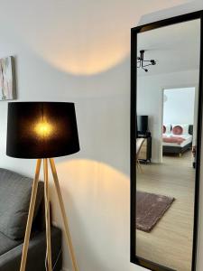 Televízia a/alebo spoločenská miestnosť v ubytovaní Mathias Premium Apartments