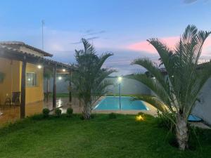 Swimming pool sa o malapit sa Rancho Casa com piscina próxima ao Rio São Francisco- Não fica no centro de Três Marias, e sim no bairro Beira Rio às margens do Rio