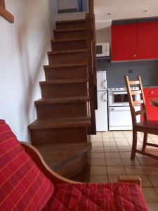 Kuchyň nebo kuchyňský kout v ubytování Chalet Lucie LE CHEVAL NOIR