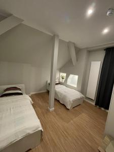 Letto o letti in una camera di Ahoi Hostel