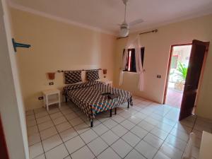 Postel nebo postele na pokoji v ubytování Estoril Hotel - Apartments