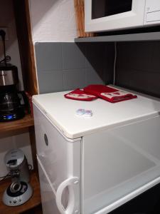 Kuchyň nebo kuchyňský kout v ubytování Chalet Lucie LE CHEVAL NOIR