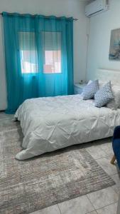 Katil atau katil-katil dalam bilik di Lovely Apartment In Mindelo City Center