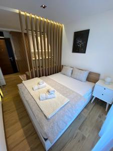 Apartman Krov Divcibareにあるベッド