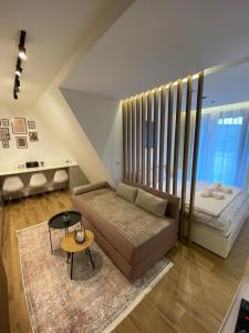 מיטה או מיטות בחדר ב-Apartman Krov Divcibare