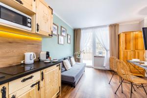 Kuchyňa alebo kuchynka v ubytovaní Pałac Tatrzański Apartamenty