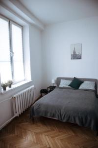 Posteľ alebo postele v izbe v ubytovaní Room in Old Town Krakow