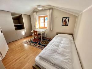 Letto o letti in una camera di Lech Hostel