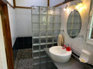 Vannituba majutusasutuses Amitie Chalets Praslin