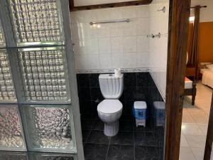Vannituba majutusasutuses Amitie Chalets Praslin