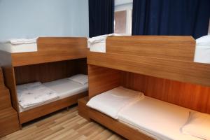 Voodi või voodid majutusasutuse Moon Hostel toas