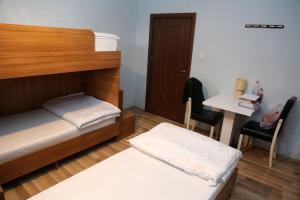 Voodi või voodid majutusasutuse Moon Hostel toas
