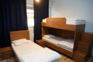 Voodi või voodid majutusasutuse Moon Hostel toas