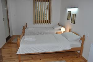 SMEŠTAJ SOLARIS kod Aqua Parka Studio Apartmani tesisinde bir odada yatak veya yataklar