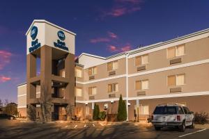 a car parked in front of a hotel at Best Western Empire Towers in Sioux Falls