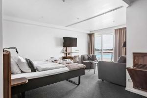 TV o dispositivi per l'intrattenimento presso Best Western Hotel Corallen