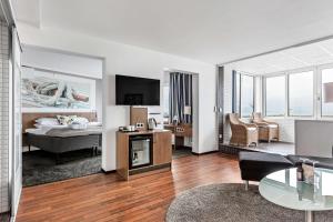 TV o dispositivi per l'intrattenimento presso Best Western Hotel Corallen