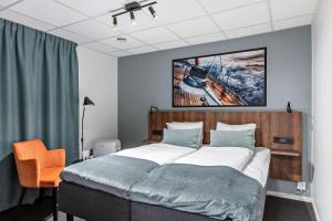 Letto o letti in una camera di Best Western Hotel Corallen
