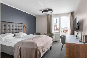 Letto o letti in una camera di Best Western Hotel Corallen