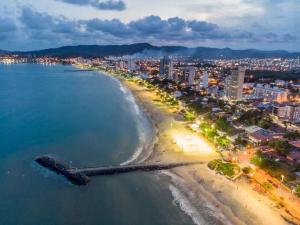 an aerial view of a beach at night at Espaço Vintage in Piçarras