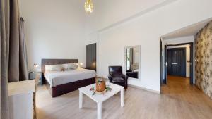 Postel nebo postele na pokoji v ubytování Bellevall hotel