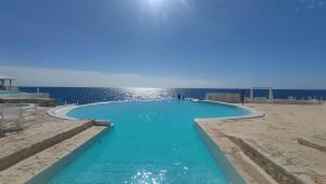 Bazén v ubytování Habitacion en Sol Dominicus solo adultos nebo v jeho okolí