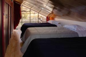 Postel nebo postele na pokoji v ubytování Casa Campo El Marquez