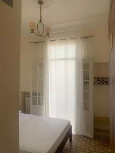 Postel nebo postele na pokoji v ubytování AFRIC HOTEL- Casbah
