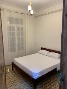 Postel nebo postele na pokoji v ubytování AFRIC HOTEL- Casbah